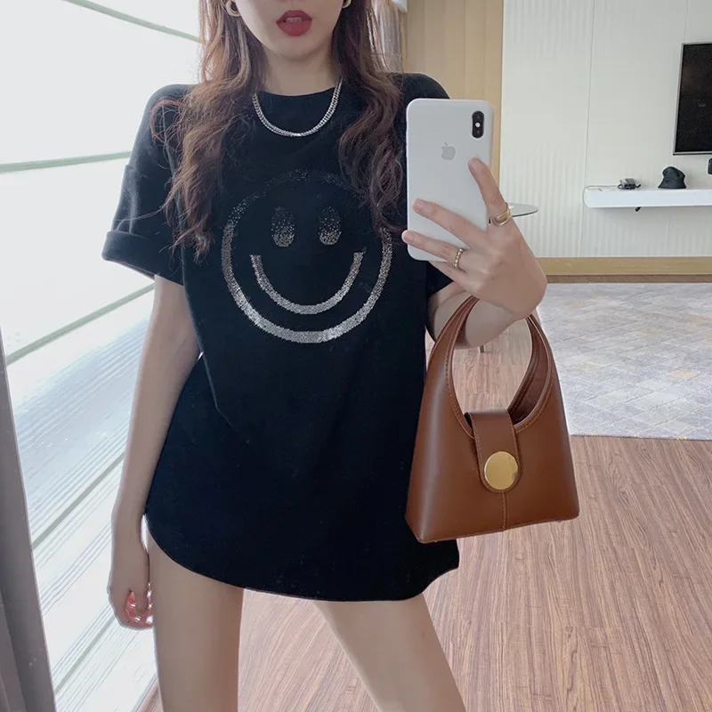 A loose-fitting short-sleeve T-shirt with smiling face prints, a new women's summer casual base shirt, round neck top, one-piece drop shipping.