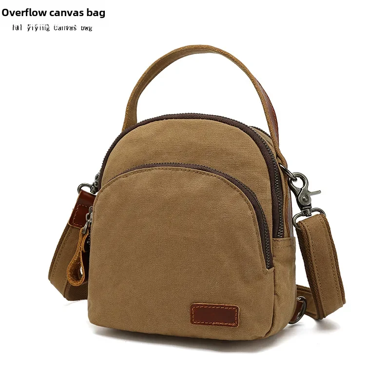Casual women's backpack waterproof canvas backpack with first layer leather handbag small solid color overflow manufacturers supply