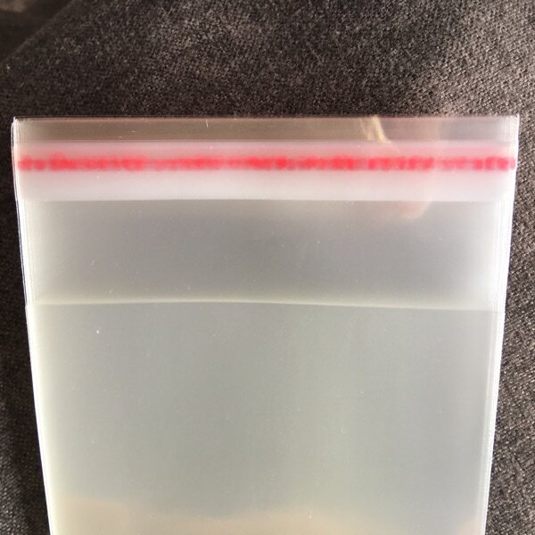 opp sealing bag with card head transparent self-adhesive bag hanging hole 7 wire self-adhesive plastic bag 9*16 5 pearlescent film