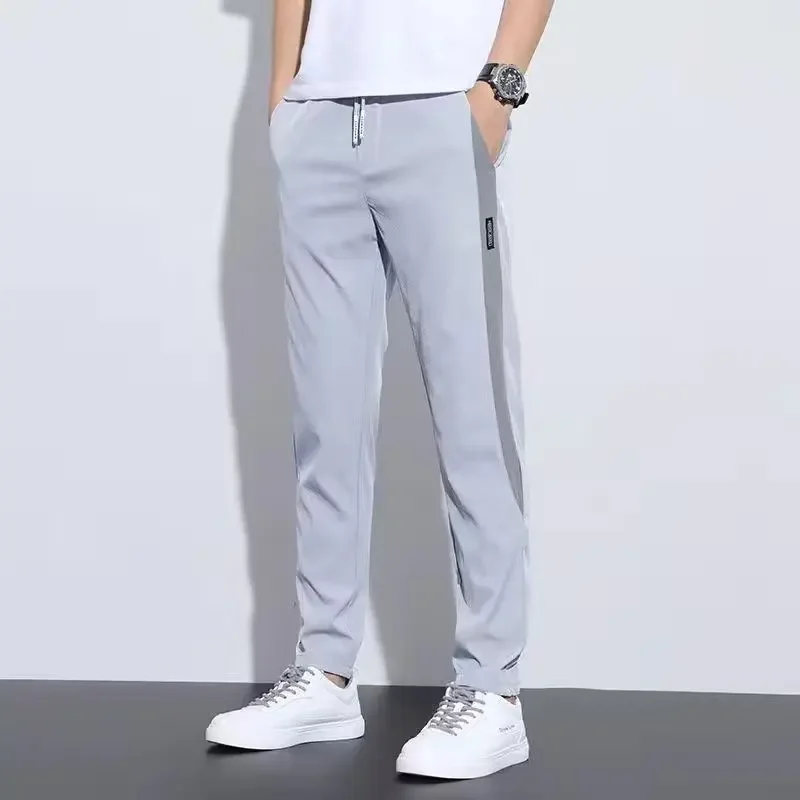 Men's new summer ice silk thin stretch casual trousers wear-resistant, dirt-resistant, loose straight sports pants breathable