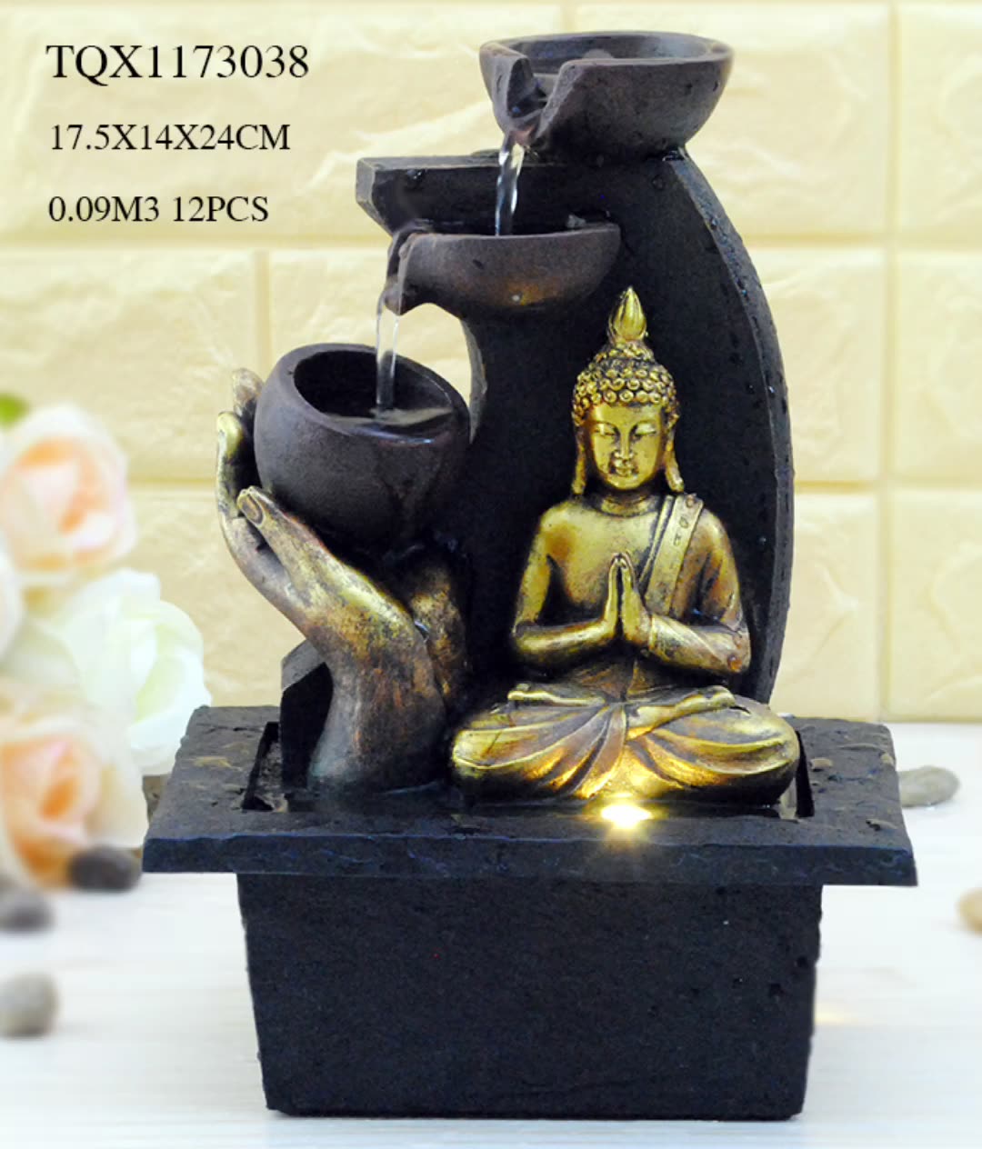 resin meditating buddha on column patio fountain with led light