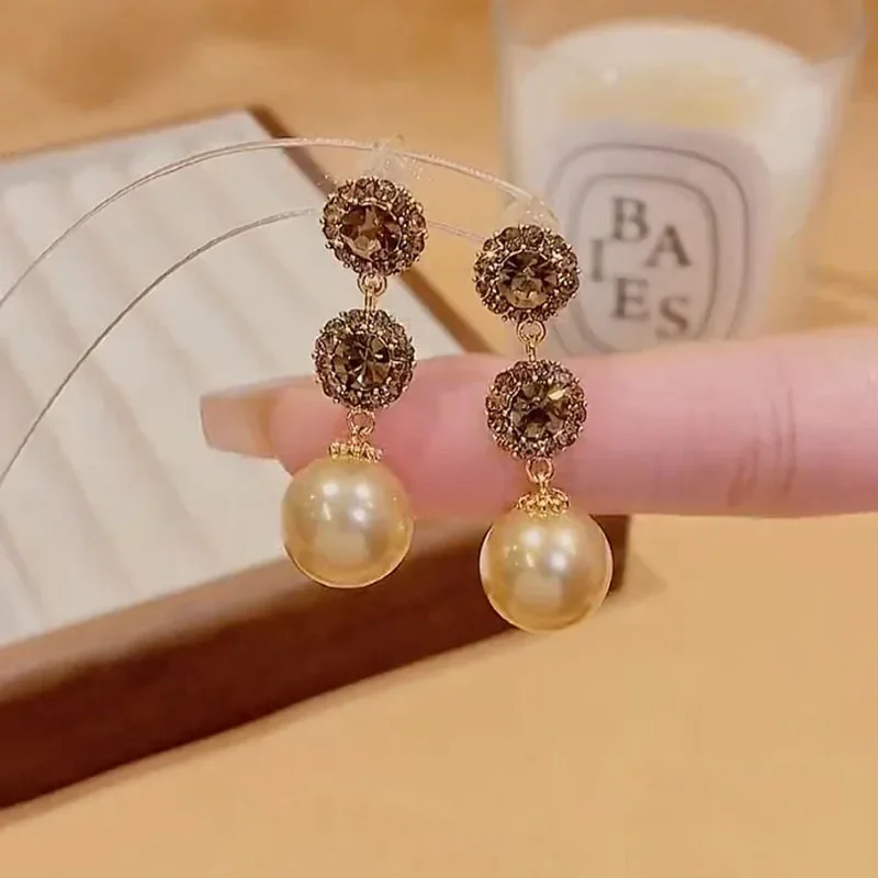 Small design elegant universal earrings with zircon from pearl
