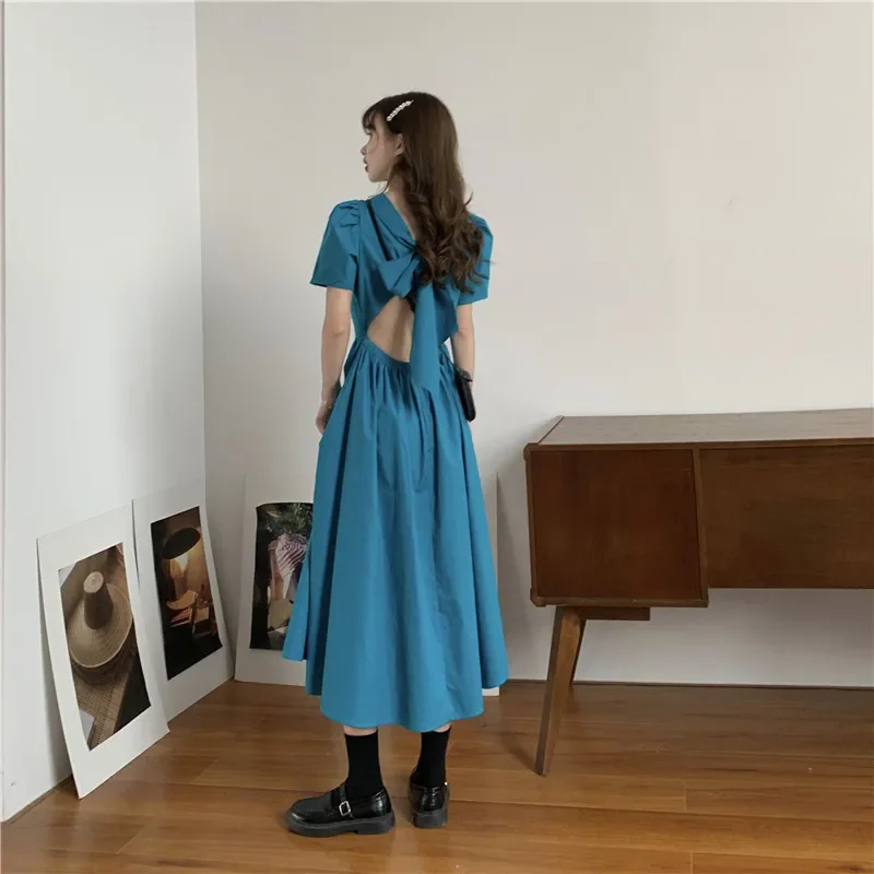 Summer thin Korean version puff sleeves with hollow bow on the back of the new loose and slim dress trendy