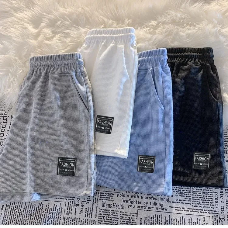 Summer waffle comfortable leisure sports shorts men and women summer loose home pajamas outside pocket shorts wholesale