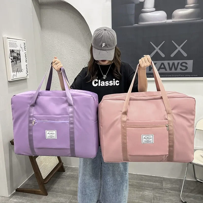 Double-layer thickened moving travel clothes quilt storage bag wholesale luggage bag portable trolley case aircraft bag