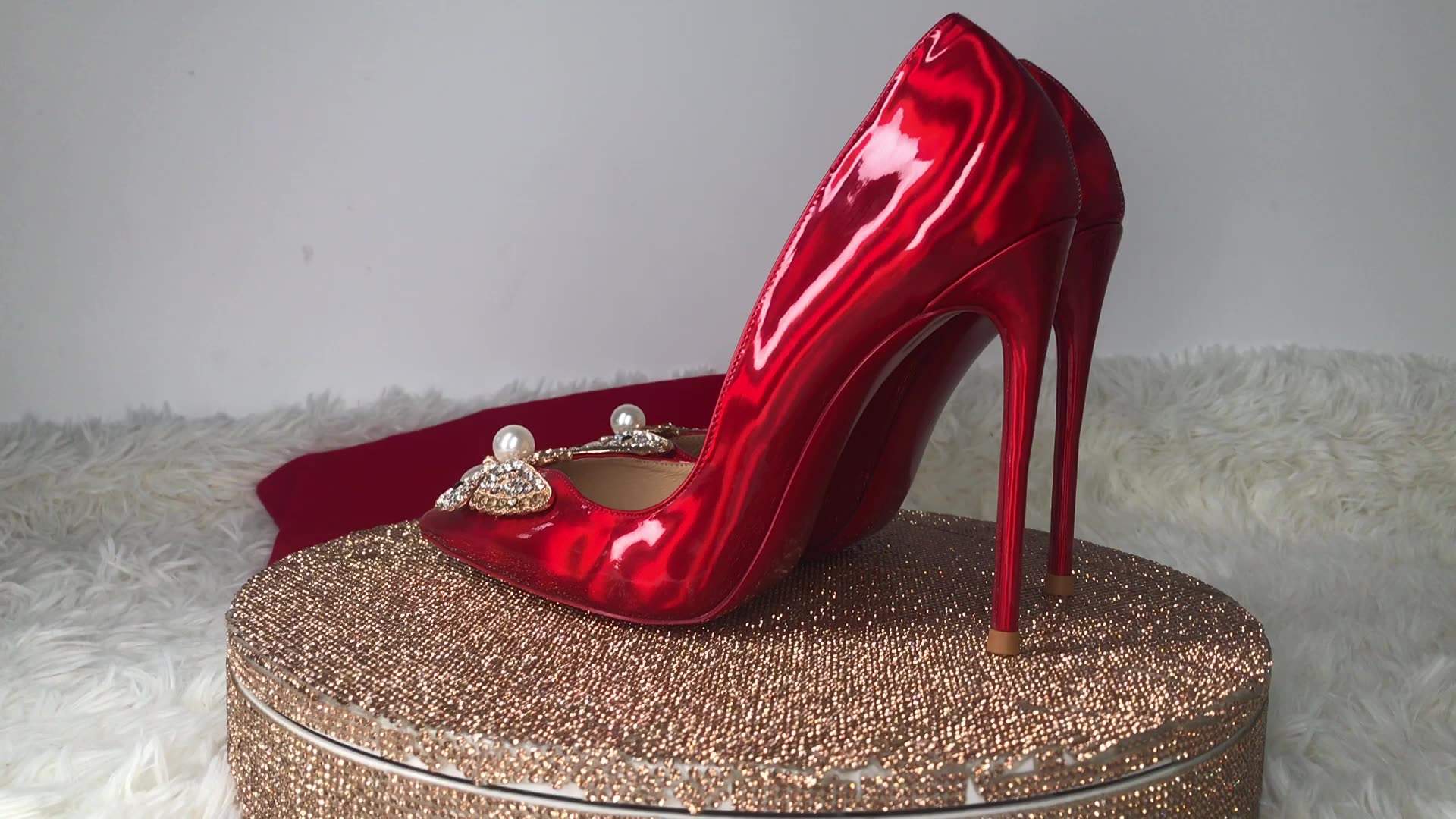 how much does a pair of red bottom heels cost