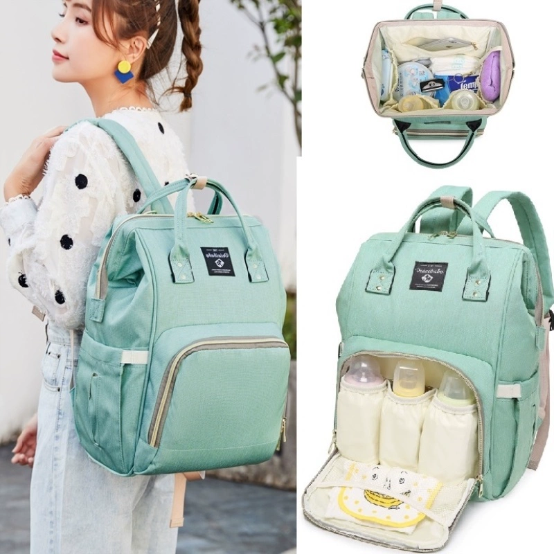 Mommy bag messenger baby baby canvas bag túi chéo túi mẹ bà bầu sữa bột túi xách tay nhỏ triều mẹ - Túi / túi Baby