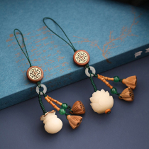 Souvenir gifts natural white jade bodhi seed carved lotus flower bag mobile phone pendant peach wood lotus pod key chain pendant
