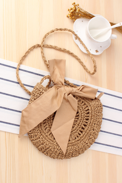 Cute Bow Crossbody Woven Hand-crocheted Round Straw Woven Bag 23*26cm display picture 1