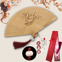 Easy to open and close hollow folding fan Wooden ancient style performance female summer gift fan Portable portable small folding fan gift box