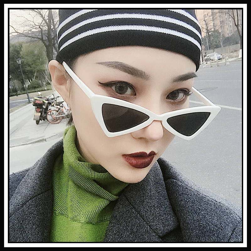 Net red white frame sunglasses Female Korean version of the tide retro Harajuku wind street shot Triangle cat eye hip hop European and American sunglasses