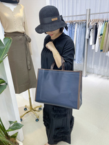 Laminated non-woven handbag waterproof Gilt shopping gift bag clothes womens clothing shop clothing bag customization