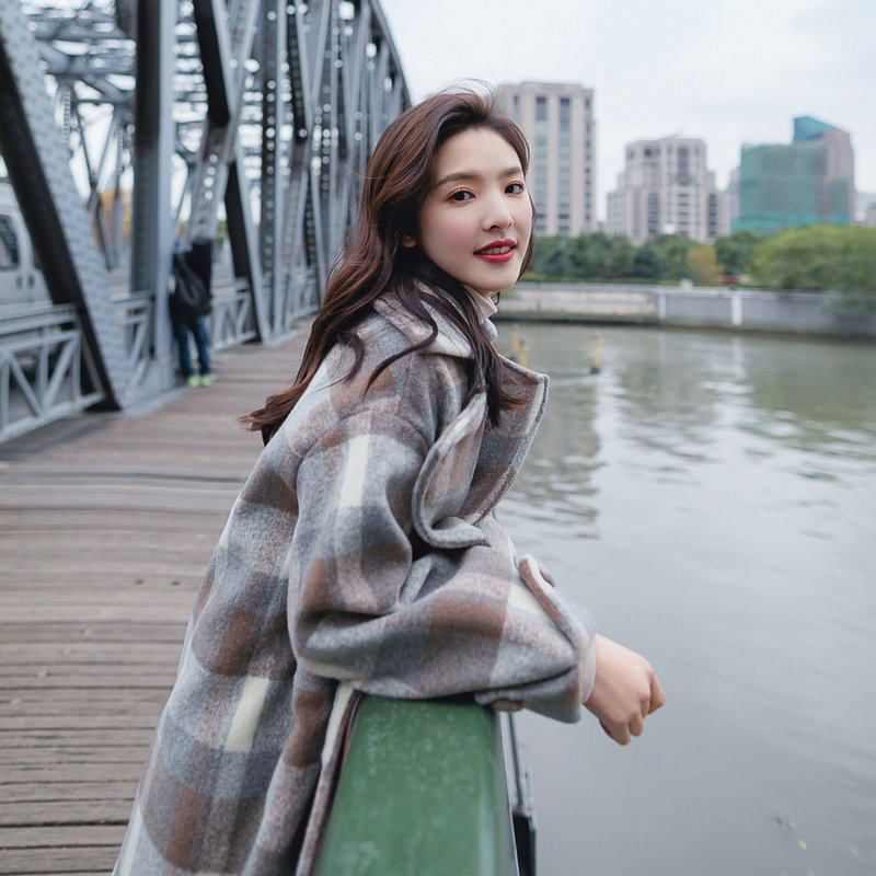 Europe station 2020 autumn and winter new plaid coat female Korean temperament medium and long loose large pocket wool coat