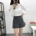 Phiên bản Hàn Quốc của quần short len ​​nữ mùa thu đông 2018 mới mặc eo co giãn đã mỏng manh khoét chân quần ống rộng Quần short