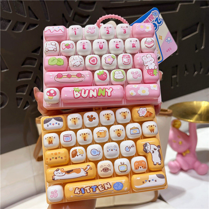 Creative, Cute, and Never-Closing 26-Key Mechanical Stress-Relief Button Toy Keychain for Children's Bags and Accessories Creative, Cute, and Never-Closing 26-Key Mechanical Stress-Relief Button Toy Keychain for Children's Bags and Accessories