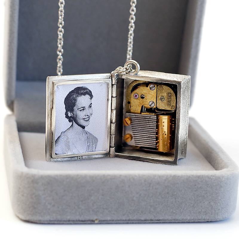 Super miniature movement Collection level 925 silver Swiss Royal Jue REUGE photo clip Music Music Music box hanging