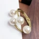 Big Pearl Fashion Tính cách hoang dã Vòng đeo tay lớn Kim loại Châu Âu và Mỹ Vòng đeo tay phóng đại Vòng tay áo len với trang trí đầu tiên Nữ tỳ hưu vàng