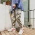 Mùa thu Nhật Bản lỏng lẻo quần nam nhiều túi giản dị rạng rỡ chân chín quần hoang dã Phiên bản Hàn Quốc mặc quần yếm nam quần jogger kaki Crop Jeans