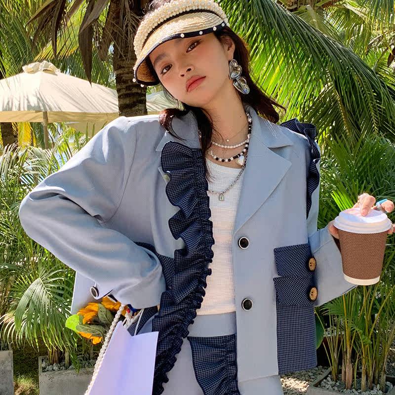 Temperament commuter fashion trend all-match white niche design sense spring new small suit jacket women