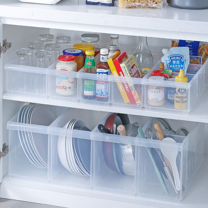 Kitchen shelve integral cupboard containing box transparent plastic condiment containing shelf pan with storage box debris containing basket