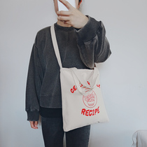 Summer new Korean version of large-capacity shopping bag female literary letter canvas shoulder bag students carry bag bag