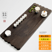 Dead Wood Fengchun Wujin Stone tea tray large whole stone tea table imitation wood creative tea tray household drainage tea Sea