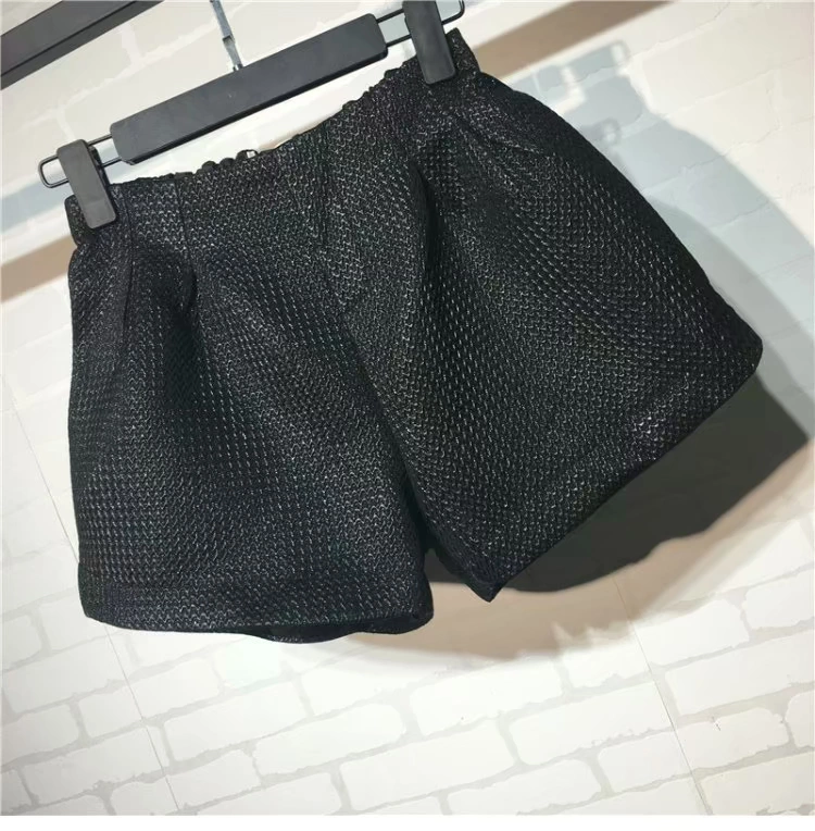 Mát mẻ mùa thu mới vàng co giãn eo quần short nữ sinh lỏng lẻo quần rộng chân rộng quần hoang dã