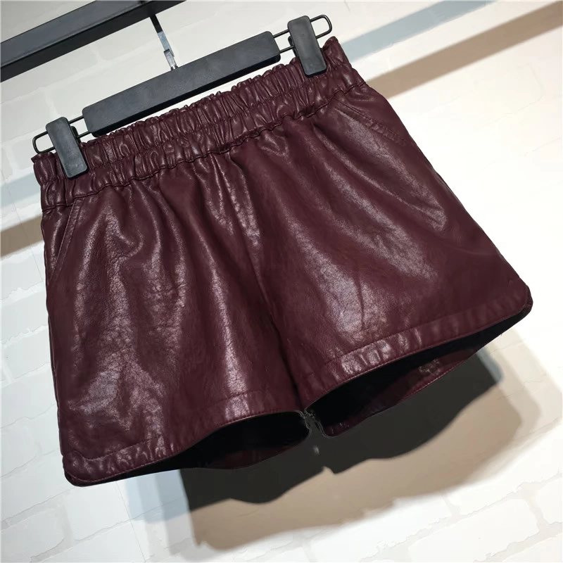 Quần da mùa thu đông mát mẻ Phiên bản Hàn Quốc mới của quần thun lưng cao một từ quần short da nữ hoang dã rộng chân rộng quần quần