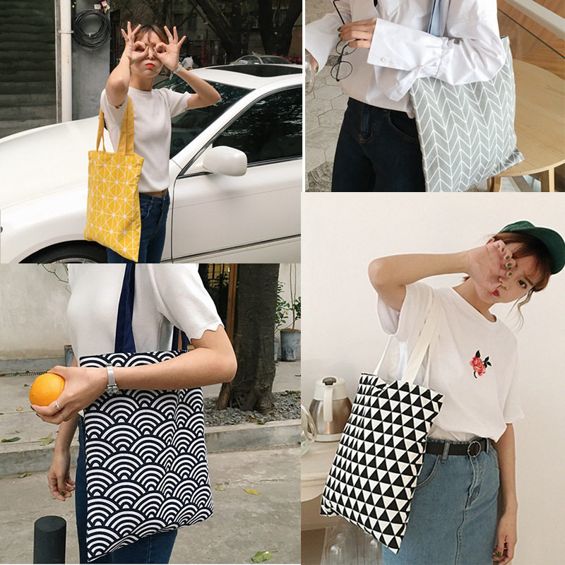 (Her main son) ins Han wind minimalist with a single shoulder canvas bag fresh and artistic geometric student sails bag handbag