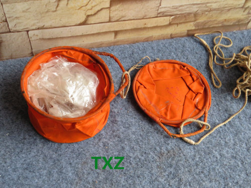 Pilots use small buckets of water for lifesaving boats