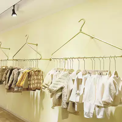 Clothing store display rack on the wall Gold wall-mounted hanger women's store hanging clothes rack Net red children's clothing rack
