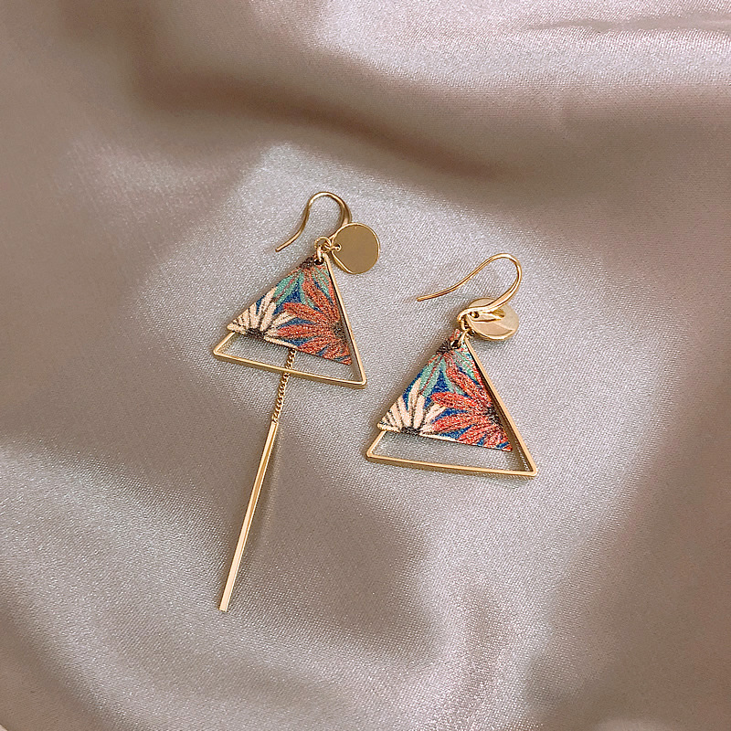 National wind Chinese wind earrings simple temperament long version of the feminine asymmetrical earrings ancient carved earrings women's jewelry