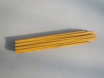 Folding wooden ruler from last century