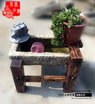 Old stone trough wooden frame Stone sink fish and flower wash basin Stone carving Jinchan old stone trough fish tank running water ornaments
