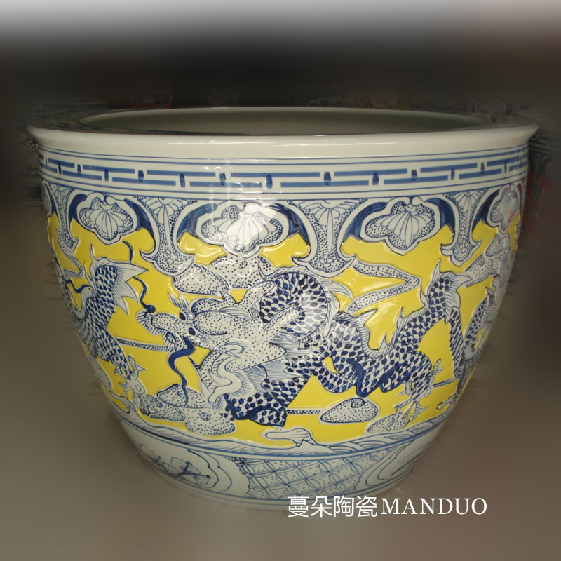 Jingdezhen yellow bottom emboss dragon China cylinder diameter 50-70 wulong China painting and calligraphy in yellow dragon cylinder