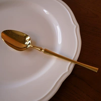 Золотая главная ложка еды