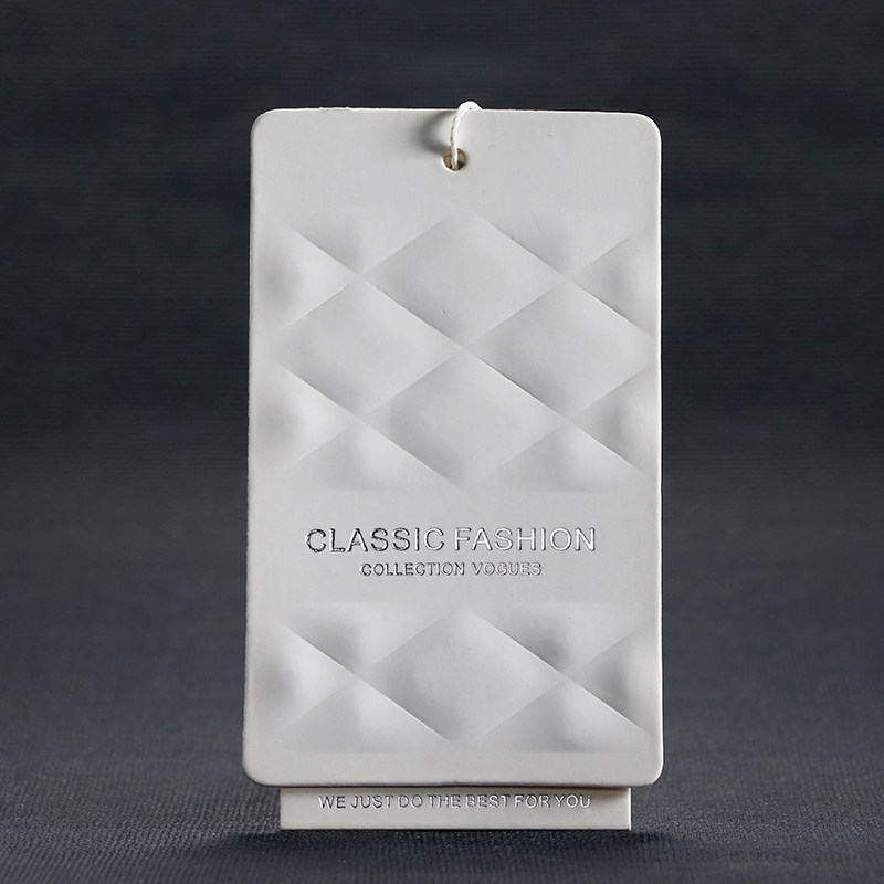 Women's clothing tag custom black and white Carter seed paper three-dimensional concave and convex Men's clothing label logo custom production
