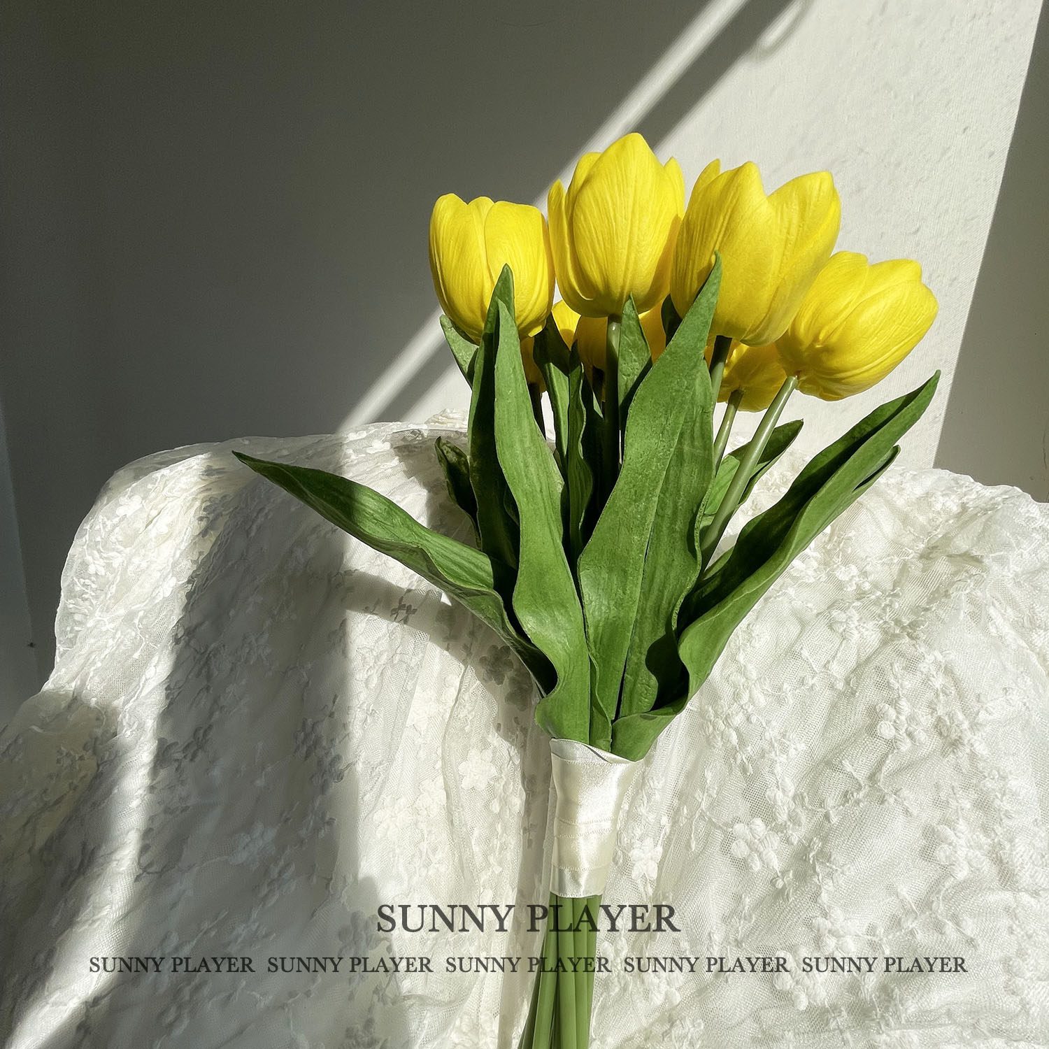 Tulip Wedding Bride's hand holding a flower collar certificate followed by a wedding with a small bouquet emulated flower wedding yarn photo prop yellow