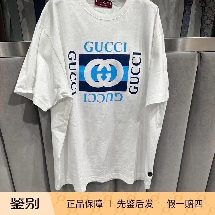 New Arrivals on July 23: Unisex Gucci T-Shirt with White Background and Blue Gg Lettering Printed Logo New Arrivals on July 23: Unisex Gucci T-Shirt with White Background and Blue Gg Lettering Printed Logo