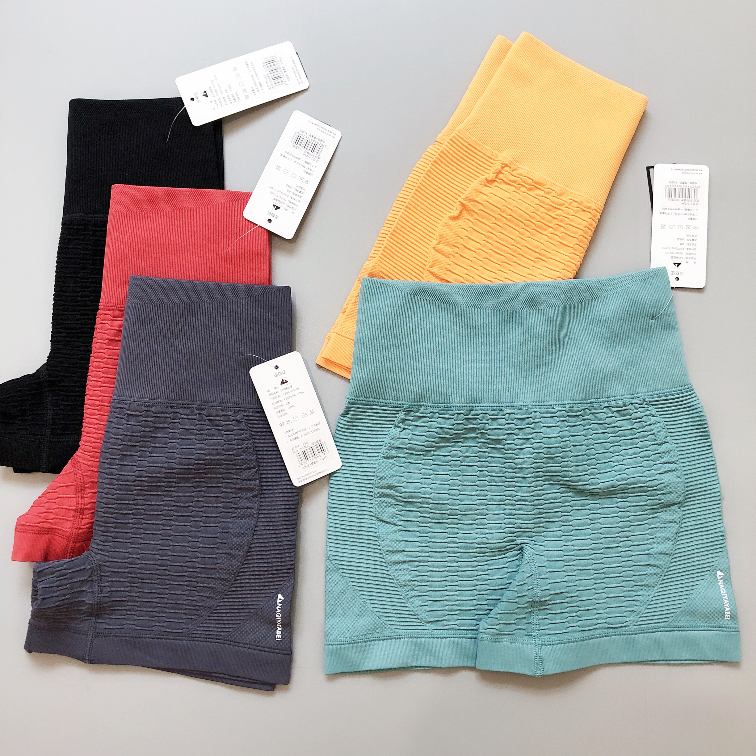 Three-point fitness pants women's belly peach lift hip elastic tight yoga high waist running sports shorts outer wear bottoming