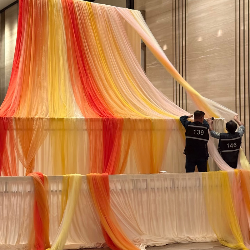 Warm Yellow, Orange, and Gold Transparent Gauze Fabric for Wedding Dresses, Wedding Celebrations, Background Ceiling Decoration, and Decorative Gauze Warm Yellow, Orange, and Gold Transparent Gauze Fabric for Wedding Dresses, Wedding Celebrations, Background Ceiling Decoration, and Decorative Gauze