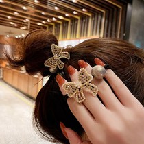 South Koreas new headdress head rope bow pearl hair rope simple female Net red ponytail ball head leather band