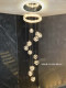 Jingmeng Modern Light Luxury Crystal Chandelier for Duplex Staircases with Multi-Head Ring Design, High-End Feel for Open-Space Living Room Lighting