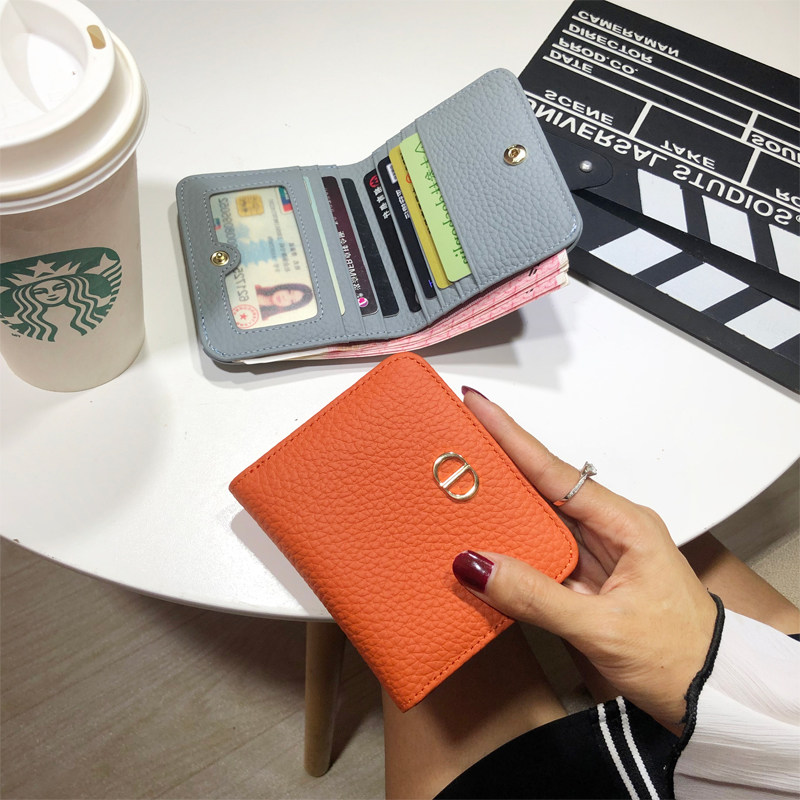 Leather wallet female design ultra thin small short short purse in the wind 2022 new blast network red