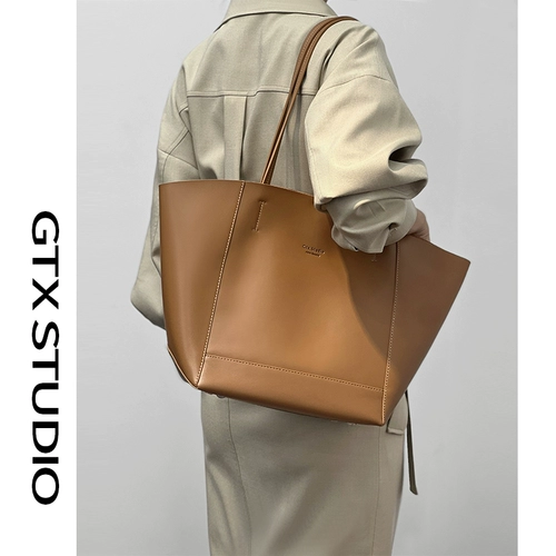 Оригинальная дизайнерская вместительная и большая демисезонная сумка, из натуральной кожи, изысканный стиль