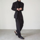 COLN Effortlessly wears a high-quality waist tie suit