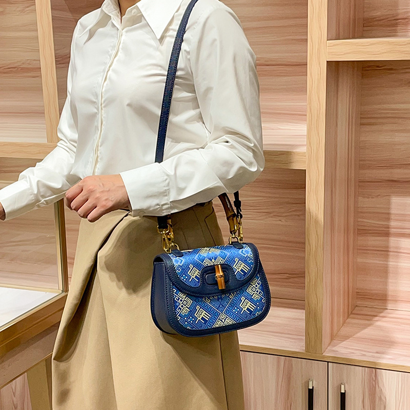Guangxi's Intangible Cultural Heritage Zhuang Brocade Bag, the Same Model from the Consumer Expo, Blue Butterfly Pattern Women's Handbag, Hand-Held, Shoulder, and Crossbody Bag, Hot-Selling Authentic Product Guangxi's Intangible Cultural Heritage Zhuang Brocade Bag, the Same Model from the Consumer Expo, Blue Butterfly Pattern Women's Handbag, Hand-Held, Shoulder, and Crossbody Bag, Hot-Selling Authentic Product