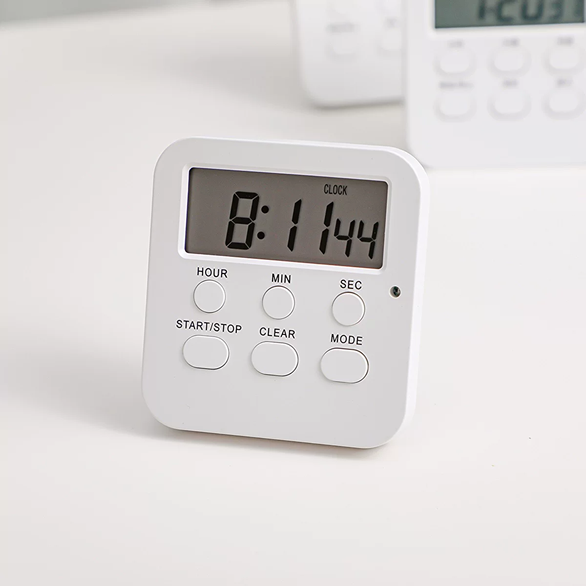 Simple white alarm clock timer Student students use self -discipline timer brush test test time manager