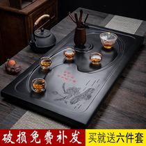 Wujin stone tea tray Household whole stone simple drainage large tea set Tea sea stone fire stone black gold tea table