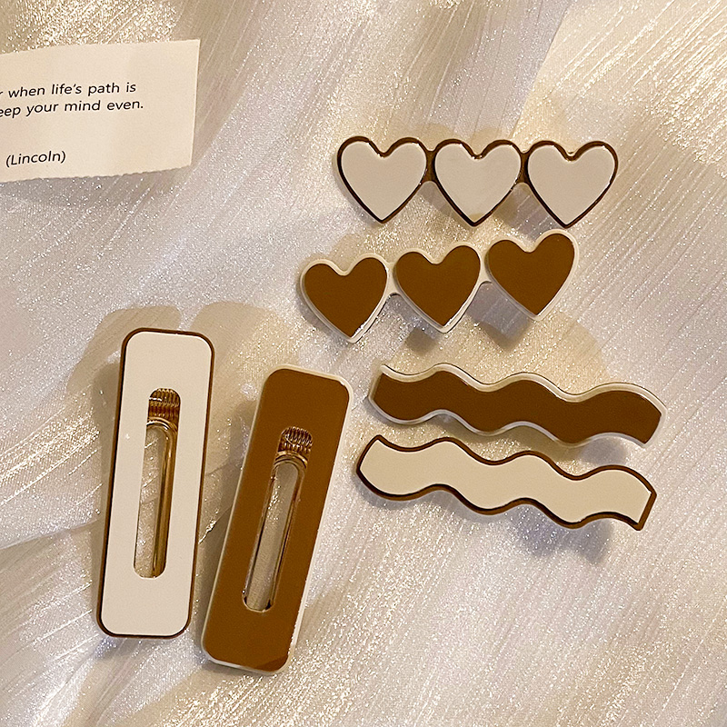 images 24:The small hair clip with the cute hair card on the side of the woman. The duck mouth is simple and exquisite Liu Hai's headdress card